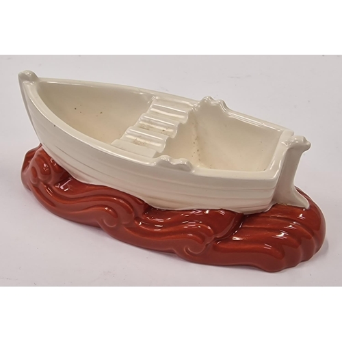 29 - Poole Pottery C95 rowing boat ash tray in Red Indian colourway.