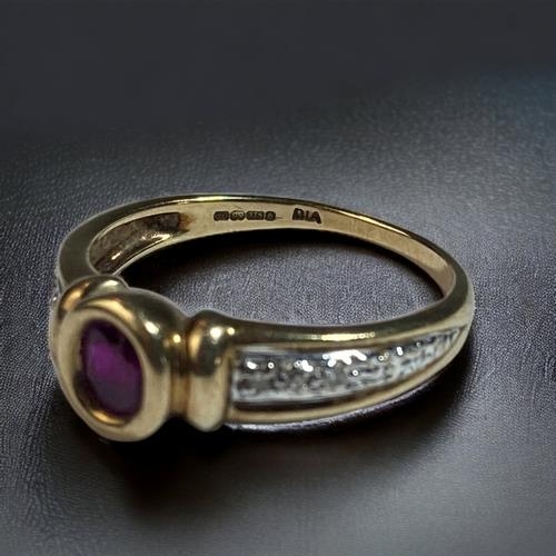 440 - A 9CT GOLD LADIES DIAMOND & RUBY RING. 
H/M DIA IN RING.
SIZE N.