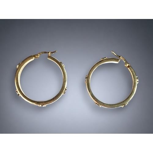 439 - 9ct gold ladies round hoop earrings in the Cartier love style 30mm