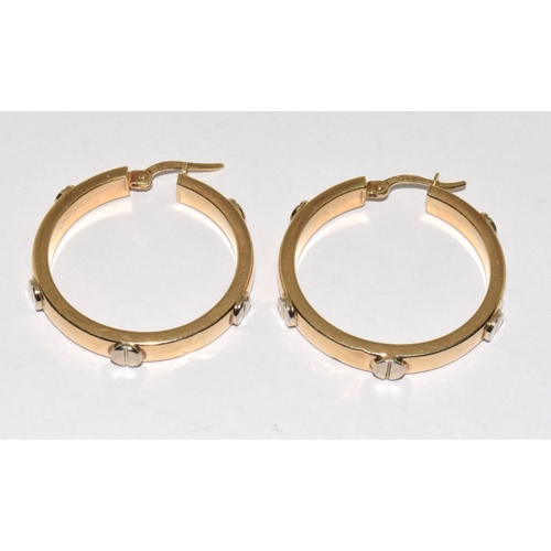 439 - 9ct gold ladies round hoop earrings in the Cartier love style 30mm