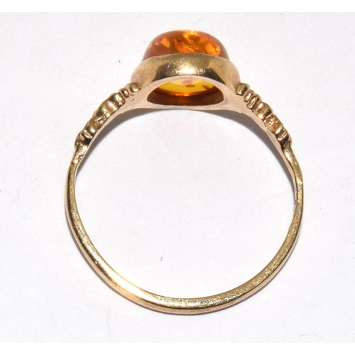 398 - 9ct gold ladies Amber ring size O