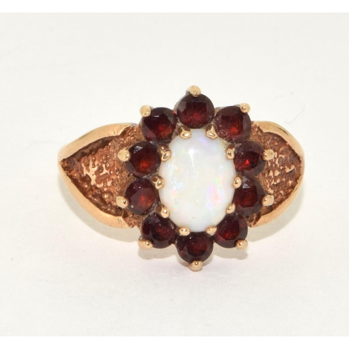 496 - 9ct gold ladies antique set Opal and garnet cluster ring size O