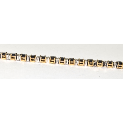 494 - 9ct gold Diamond and Sapphire Tennis bracelet