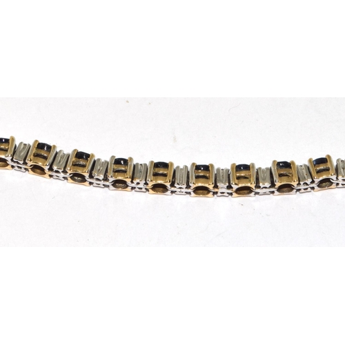 494 - 9ct gold Diamond and Sapphire Tennis bracelet