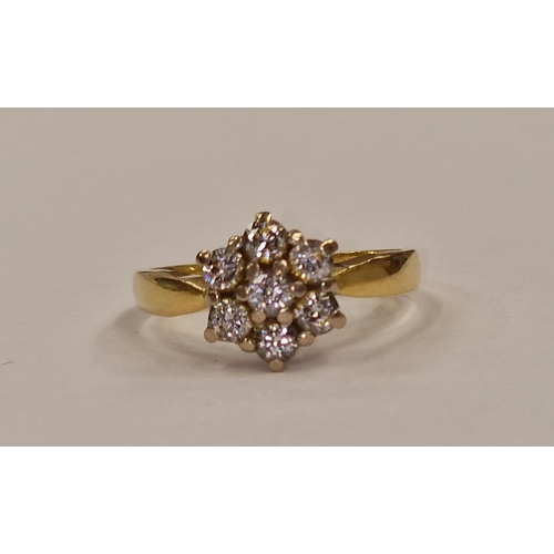 483 - Diamond daisy ring set in 5g, 18ct gold ring Size O