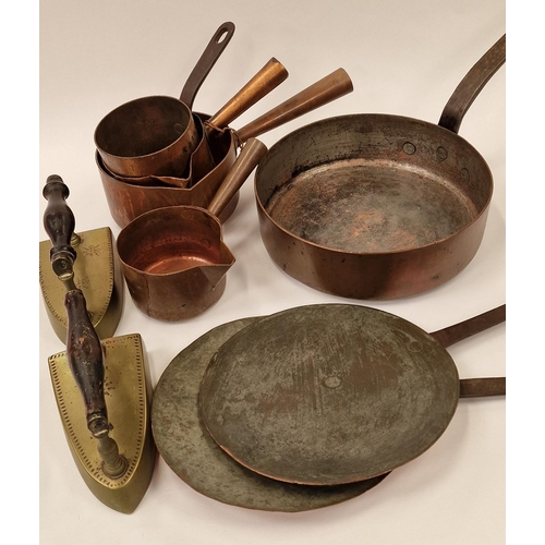 61 - Collection of antique copper and brassware to include saucepans and irons (9).