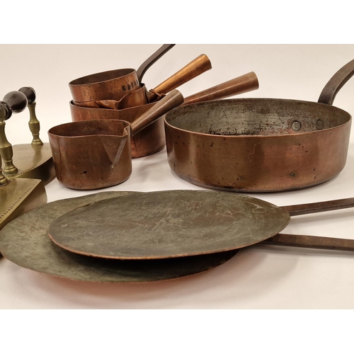 61 - Collection of antique copper and brassware to include saucepans and irons (9).