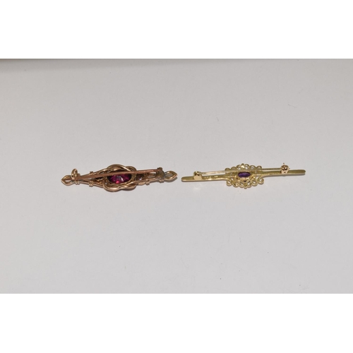 419 - 2 x 9ct gold Amethyst  brooches 1 has Diamond either side 7g