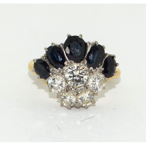 476 - 18ct gold ladies Diamond and Sapphire ring approx 0.75ct diamond and 1ct sapphire  size P