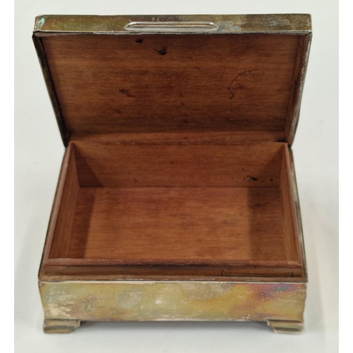 385 - Silver hallmarked wood lined cigarette box with black enamel patterned lid. Birmingham 1957.