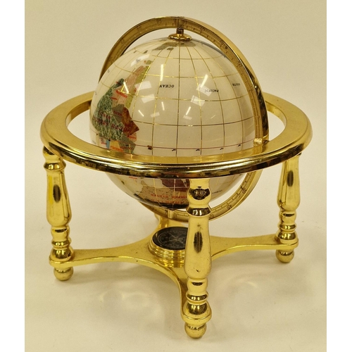 38 - Contemporary gem set revolving globe of the world 24cm tall.