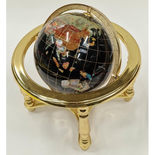 38 - Contemporary gem set revolving globe of the world 24cm tall.