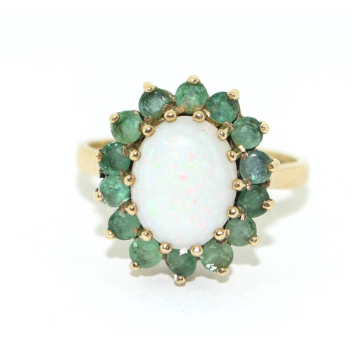 438 - 9ct gold ladies Emerald and opal cluster ring size M