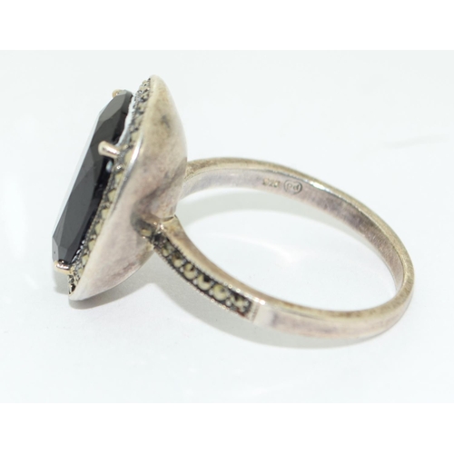 401 - An onyx and marcasite 925 silver cocktail ring Size S