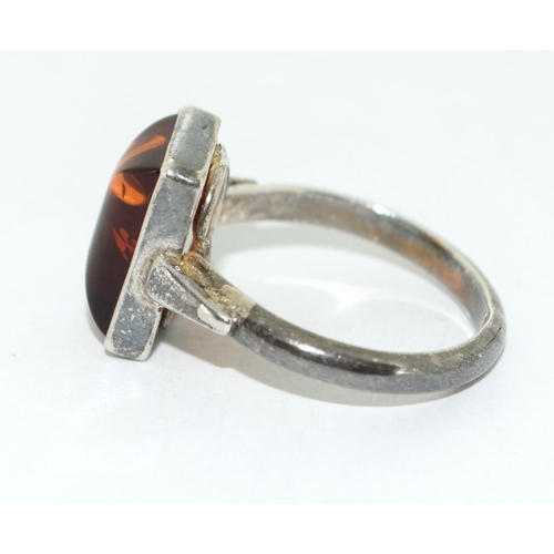 425 - A rectangular set amber 925 silver ring Size M