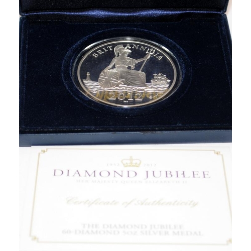 174 - 2012 Diamond Jubilee 5oz Britannia .999 silver coin embellished with diamonds and applied gold accen... 