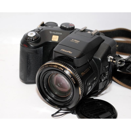 240 - Small collection of digital cameras to include a Fuji Finepix S7000. On behalf of Age Concern