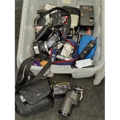 157 - Collection of various compact digital cameras and accessories.