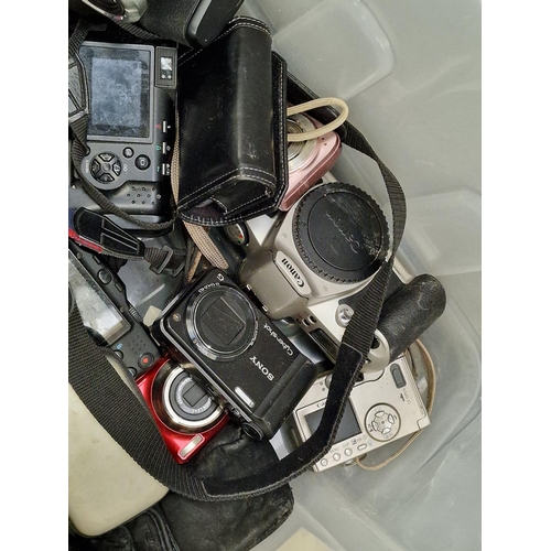 157 - Collection of various compact digital cameras and accessories.