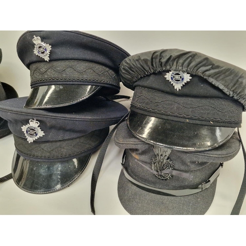 254 - Collection of hats to include police uniform hats (6).