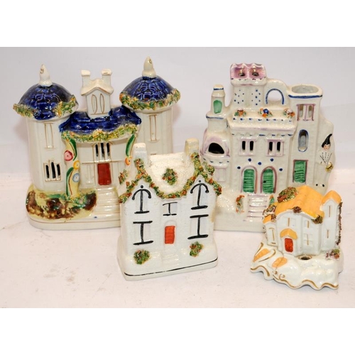 67 - Antique Staffordshire flatback buildings to include castle spill vase and money box. Largest is 18cm... 