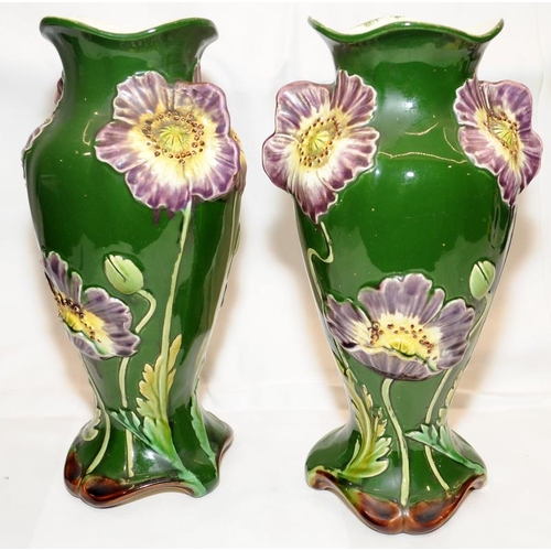 79 - pair of antique Art Nouveau majolica vases with applied flower decoration on dark green ground. 31cm... 