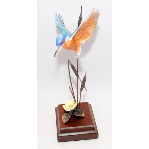 86 - Cold cast bronze figure of a kingfisher amongst bullrushes. Approx 33cms tall including base