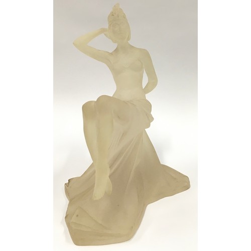 89 - An Art Deco style resin figurine of a seated lady 34cm tall.