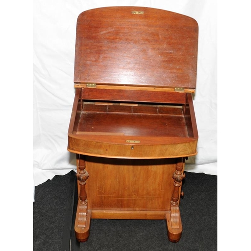 323 - Reproduction Davenport desk with two hinged compartments and four drawers. 78cms tall x 52cms wide x... 