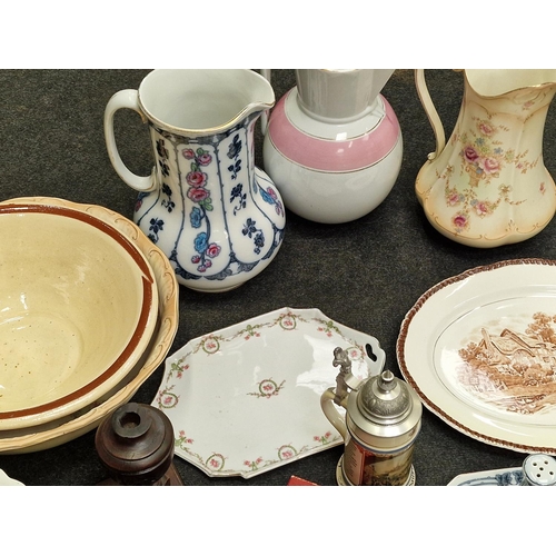 261 - Large collection of various ceramics, glassware and other collectables to include water jugs.