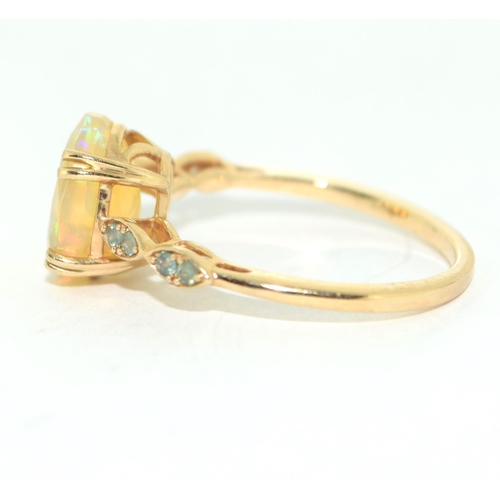 500 - Opal solitaire 9ct gold ring Size O