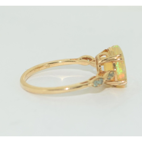 500 - Opal solitaire 9ct gold ring Size O