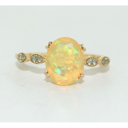 500 - Opal solitaire 9ct gold ring Size O