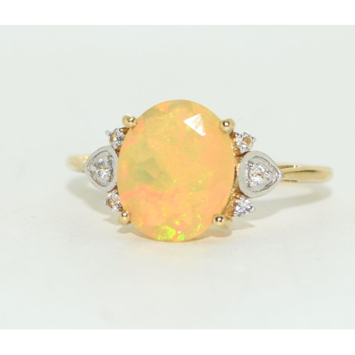 413 - Yellow large opal/Diamond 9ct gold ring Size S