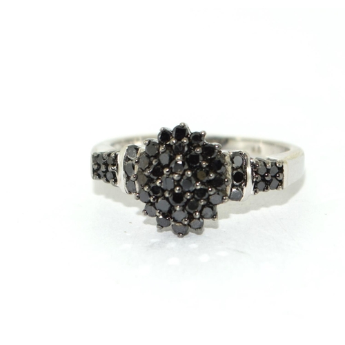 455 - Black diamond set in 9ct white gold ring Size L