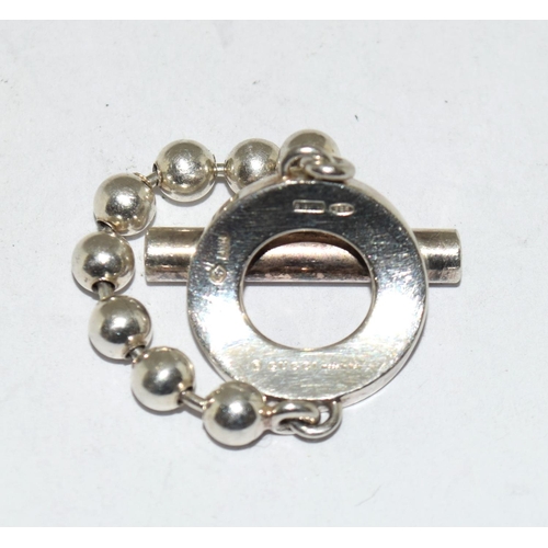 529 - A silver Gucci hallmarked bracelet style ring Size N