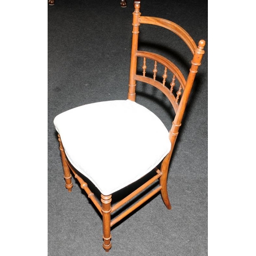 607 - Edwardian bedroom chair with faux bamboo frame and bobbin back panel. Seat height 44cms