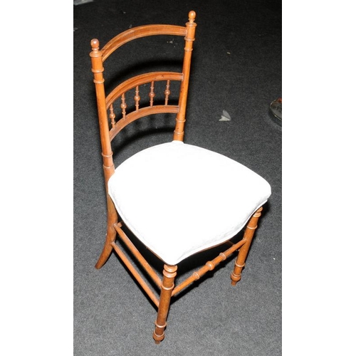 607 - Edwardian bedroom chair with faux bamboo frame and bobbin back panel. Seat height 44cms