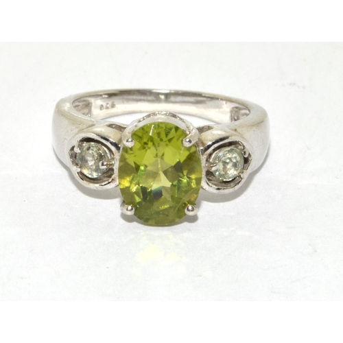 465 - Peridot 925 silver crucifix and ring Size J 1/2.