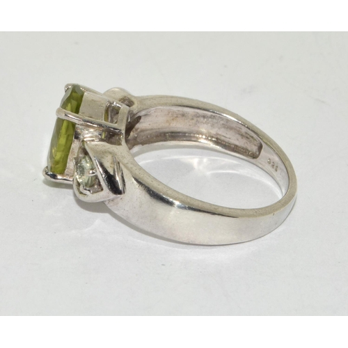 465 - Peridot 925 silver crucifix and ring Size J 1/2.