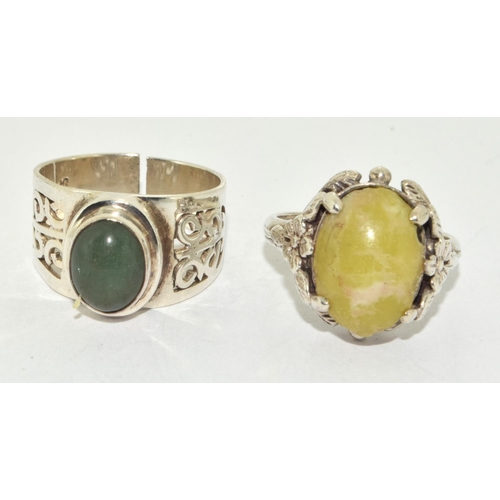 501 - Two vintage 925 silver Jade Scottish hard stone rings.