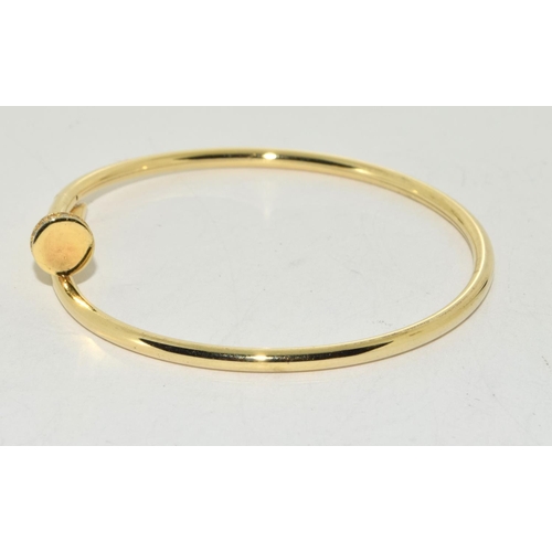 444 - Designed gold metal bangle and tested gold on silver ring Size O