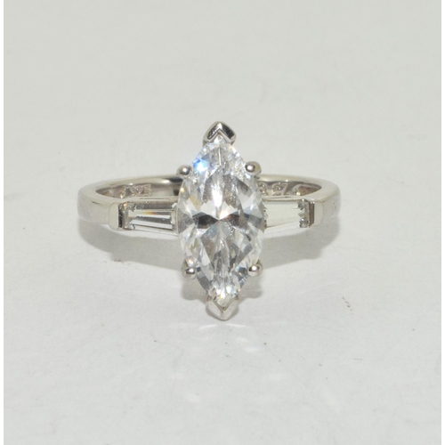 446 - A 925 silver and CZ ring, Size P.