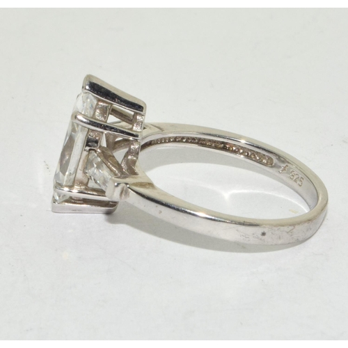 446 - A 925 silver and CZ ring, Size P.