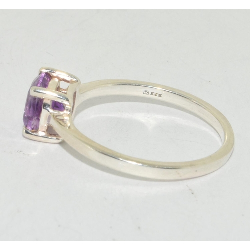 428 - A 925 silver and amethyst ring Size N.