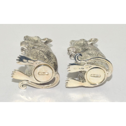 409 - A pair of silver plated mouse shaped condiments.