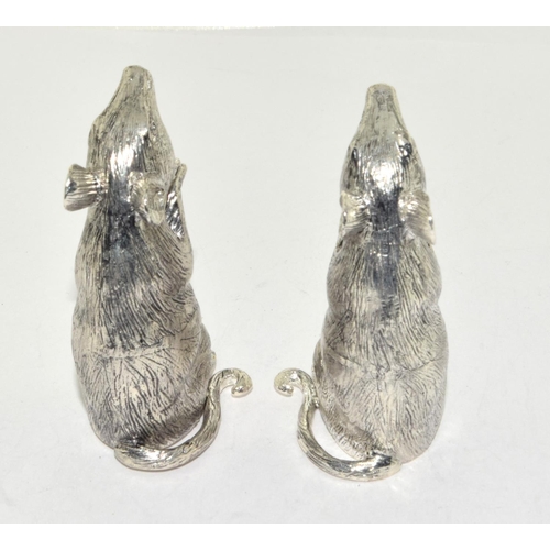 409 - A pair of silver plated mouse shaped condiments.