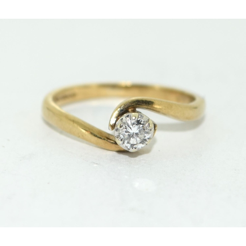 456 - An 18ct yellow gold single stone diamond ring of 20 points. Size L