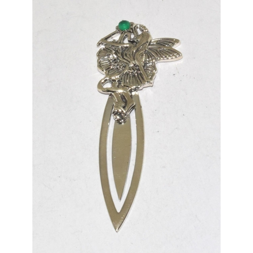 485 - A silver bookmark with fairy finial set with emerald cabochon