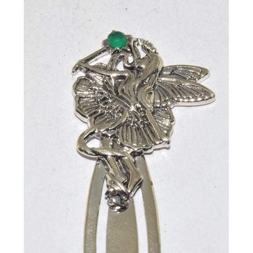 485 - A silver bookmark with fairy finial set with emerald cabochon